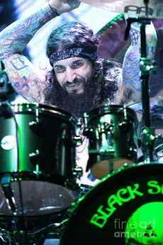 Tommy Clufetos poster